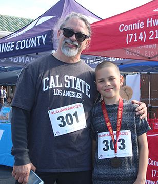 father and son posing after 2020 La Habra Race