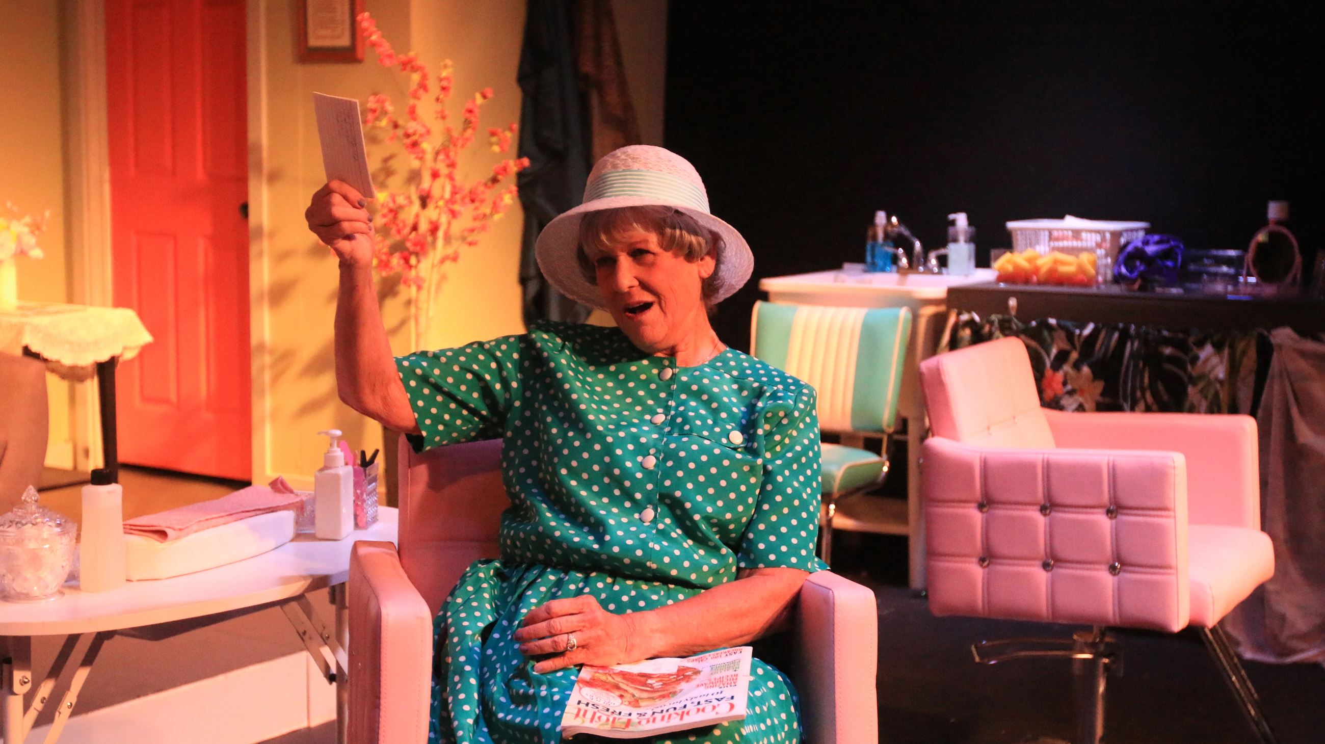 Character in Steel Magnolias looks at herself in a mirror