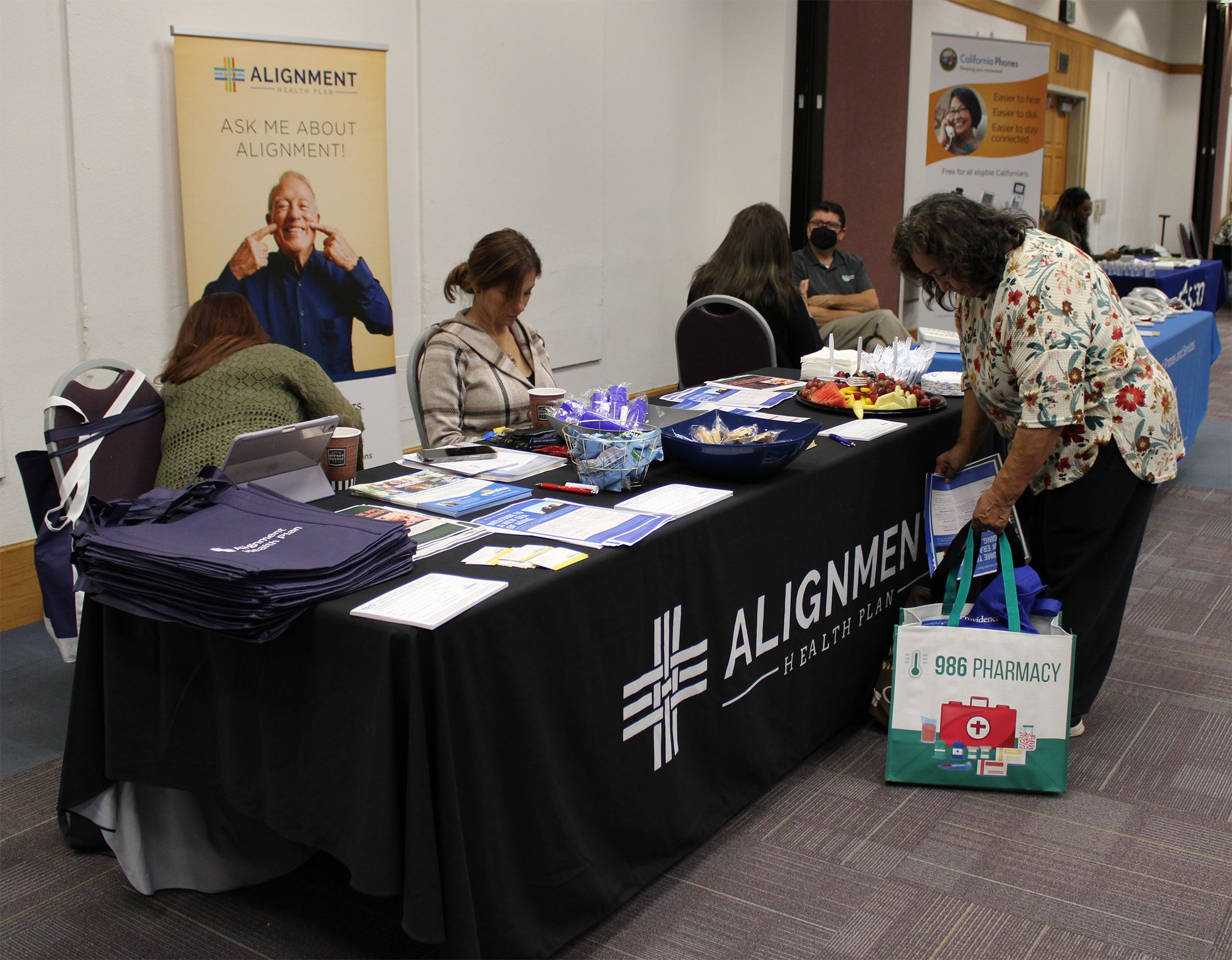 senior at alignment health plan table