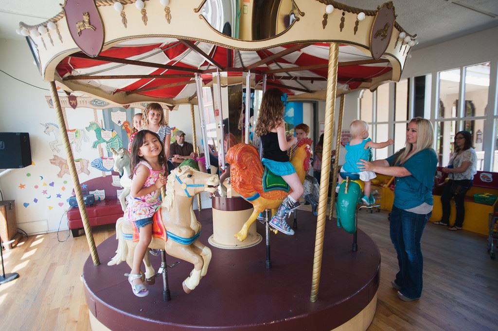 Kids Riding Carousel